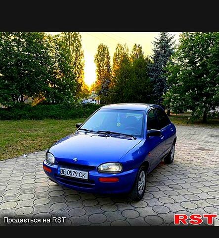 Синій Мазда 3, об'ємом двигуна 1.3 л та пробігом 287 тис. км за 1300 $, фото 2 на Automoto.ua