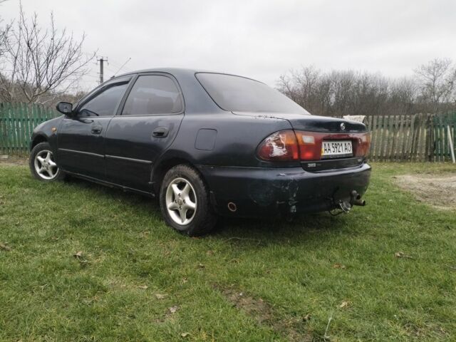 Синий Мазда 3, объемом двигателя 1.5 л и пробегом 260 тыс. км за 1300 $, фото 5 на Automoto.ua