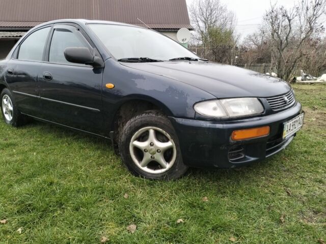 Синий Мазда 3, объемом двигателя 1.5 л и пробегом 260 тыс. км за 1300 $, фото 6 на Automoto.ua