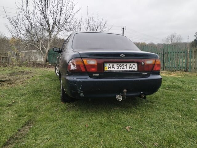 Синий Мазда 3, объемом двигателя 1.5 л и пробегом 260 тыс. км за 1300 $, фото 8 на Automoto.ua