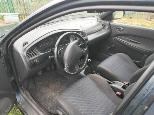 Синий Мазда 3, объемом двигателя 1.5 л и пробегом 260 тыс. км за 1300 $, фото 7 на Automoto.ua