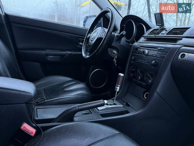 Синій Мазда 3, об'ємом двигуна 2.3 л та пробігом 212 тис. км за 4500 $, фото 9 на Automoto.ua