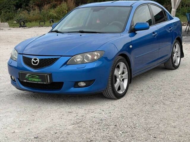 Синій Мазда 3, об'ємом двигуна 2 л та пробігом 226 тис. км за 4498 $, фото 2 на Automoto.ua
