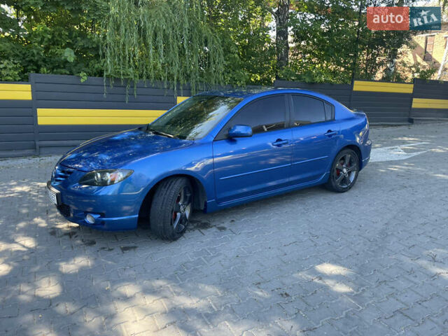Синій Мазда 3, об'ємом двигуна 2 л та пробігом 262 тис. км за 4999 $, фото 5 на Automoto.ua