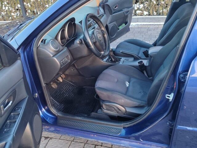Синий Мазда 3, объемом двигателя 2 л и пробегом 273 тыс. км за 2699 $, фото 33 на Automoto.ua