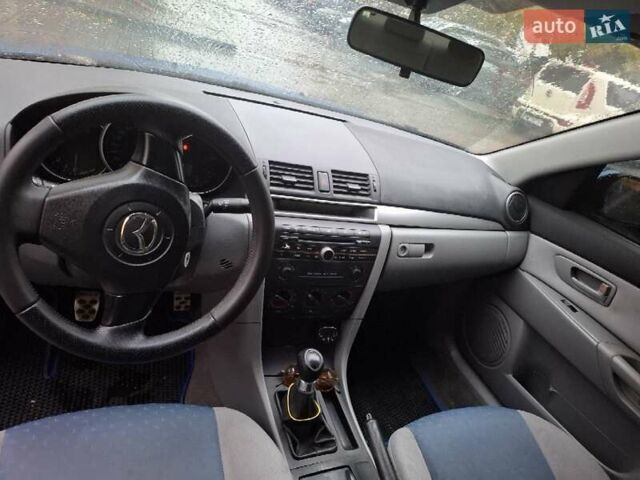Синий Мазда 3, объемом двигателя 1.6 л и пробегом 186 тыс. км за 4450 $, фото 7 на Automoto.ua