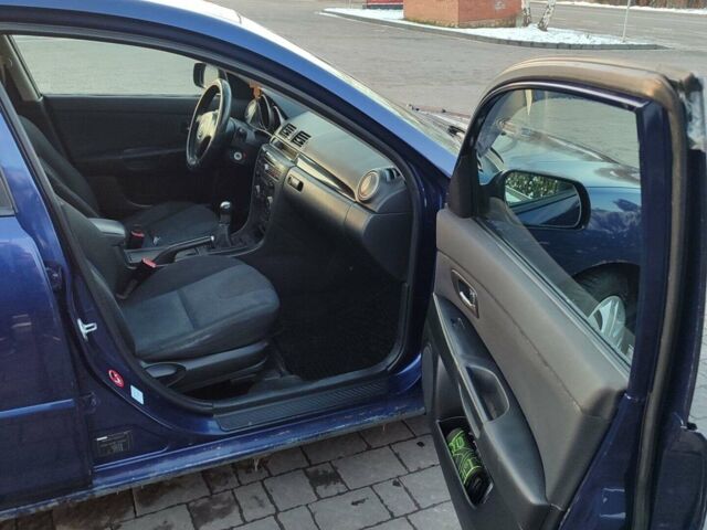 Синий Мазда 3, объемом двигателя 2 л и пробегом 273 тыс. км за 2699 $, фото 24 на Automoto.ua