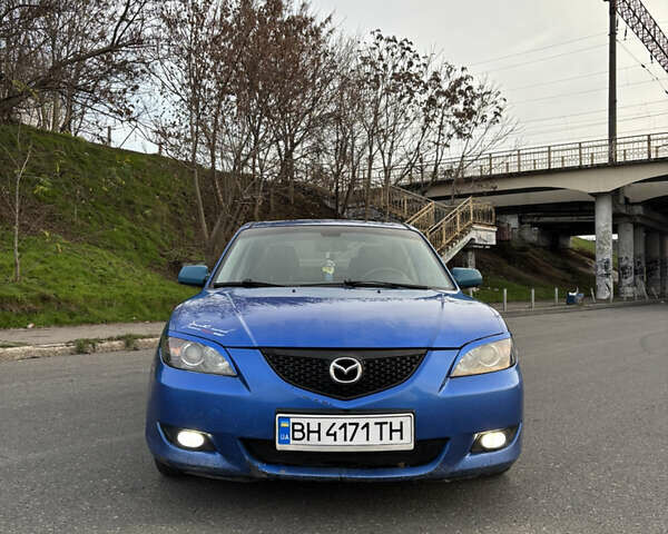 Синий Мазда 3, объемом двигателя 2 л и пробегом 325 тыс. км за 4500 $, фото 1 на Automoto.ua