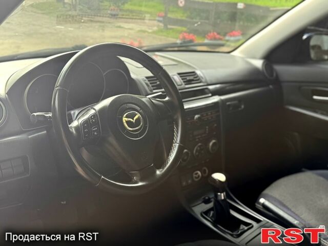 Синій Мазда 3, об'ємом двигуна 1.6 л та пробігом 225 тис. км за 3300 $, фото 6 на Automoto.ua
