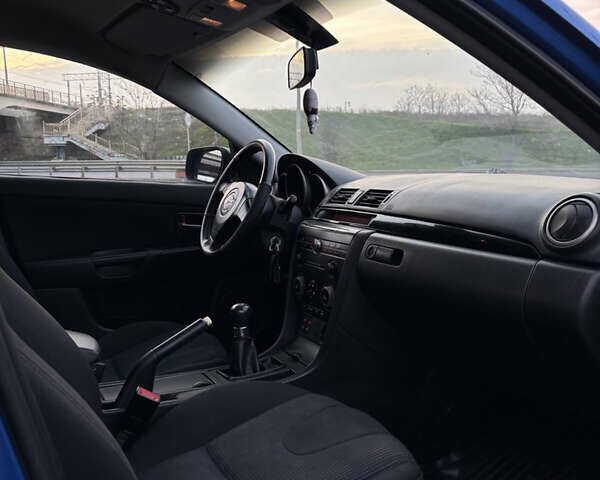 Синий Мазда 3, объемом двигателя 2 л и пробегом 325 тыс. км за 4500 $, фото 7 на Automoto.ua