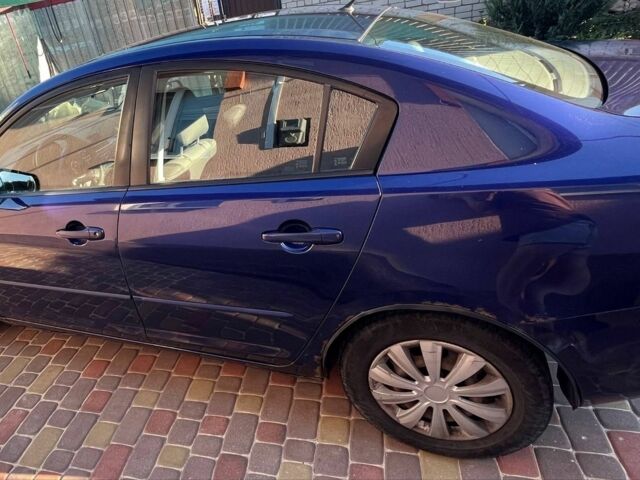Синий Мазда 3, объемом двигателя 1.6 л и пробегом 230 тыс. км за 4000 $, фото 1 на Automoto.ua