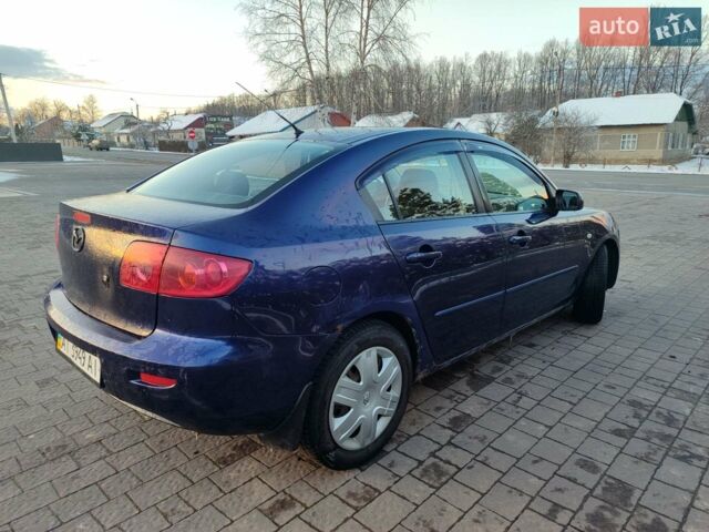 Синий Мазда 3, объемом двигателя 2 л и пробегом 273 тыс. км за 2699 $, фото 4 на Automoto.ua