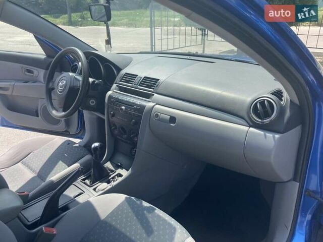 Синий Мазда 3, объемом двигателя 1.6 л и пробегом 233 тыс. км за 3550 $, фото 14 на Automoto.ua