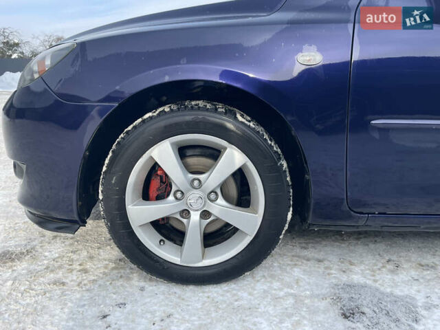 Синий Мазда 3, объемом двигателя 1.56 л и пробегом 280 тыс. км за 4950 $, фото 4 на Automoto.ua