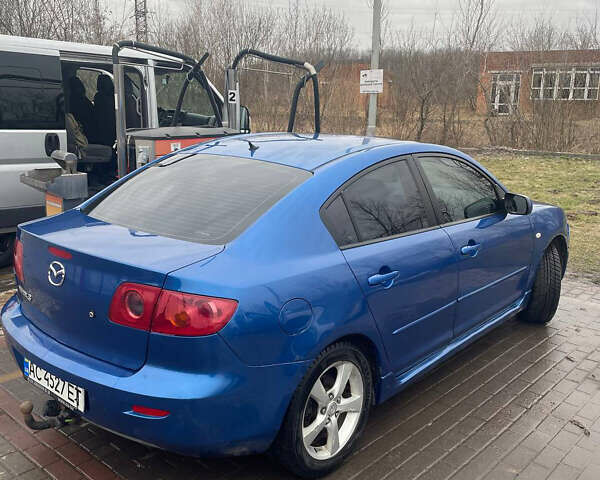 Синий Мазда 3, объемом двигателя 1.6 л и пробегом 350 тыс. км за 4400 $, фото 5 на Automoto.ua