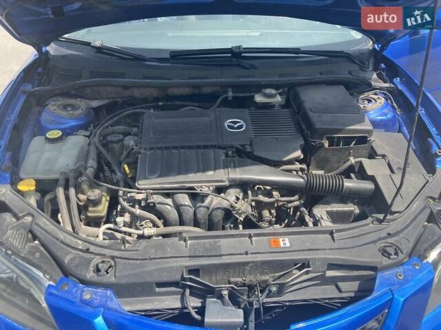 Синий Мазда 3, объемом двигателя 1.6 л и пробегом 233 тыс. км за 3550 $, фото 17 на Automoto.ua