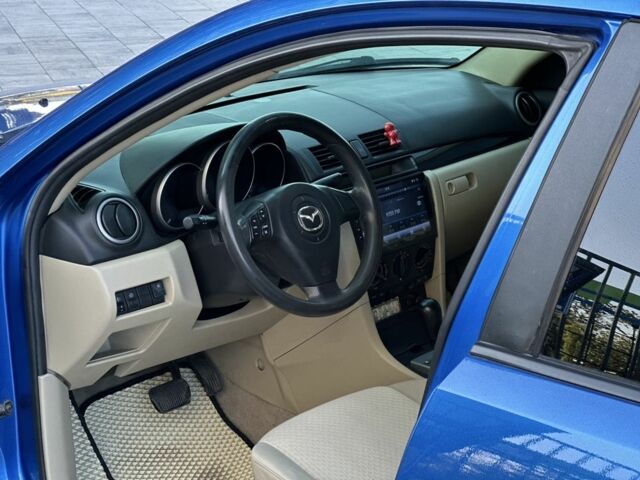 Синий Мазда 3, объемом двигателя 1.6 л и пробегом 295 тыс. км за 4700 $, фото 9 на Automoto.ua