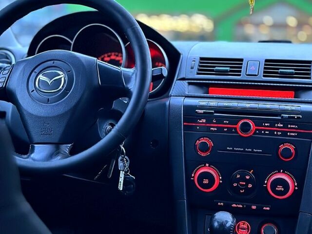 Синій Мазда 3, об'ємом двигуна 1.6 л та пробігом 330 тис. км за 4399 $, фото 10 на Automoto.ua