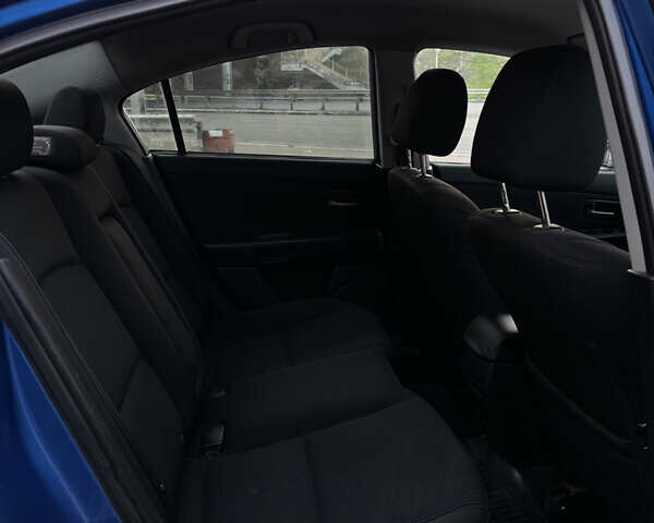 Синий Мазда 3, объемом двигателя 2 л и пробегом 325 тыс. км за 4500 $, фото 8 на Automoto.ua
