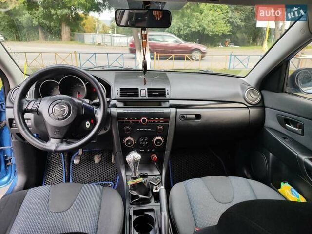 Синий Мазда 3, объемом двигателя 1.6 л и пробегом 240 тыс. км за 3800 $, фото 3 на Automoto.ua