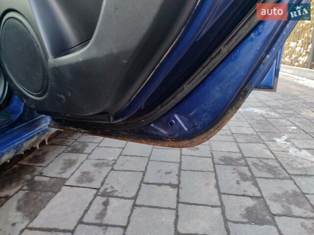 Синий Мазда 3, объемом двигателя 2 л и пробегом 273 тыс. км за 2699 $, фото 29 на Automoto.ua