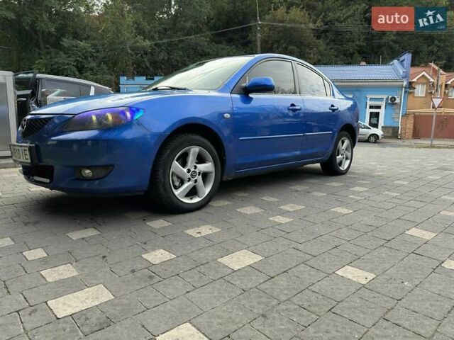 Синий Мазда 3, объемом двигателя 1.6 л и пробегом 240 тыс. км за 3800 $, фото 1 на Automoto.ua