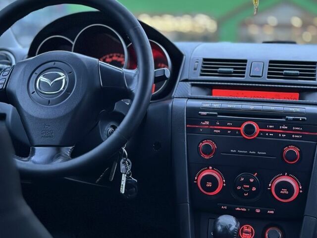 Синій Мазда 3, об'ємом двигуна 1.6 л та пробігом 330 тис. км за 4399 $, фото 19 на Automoto.ua