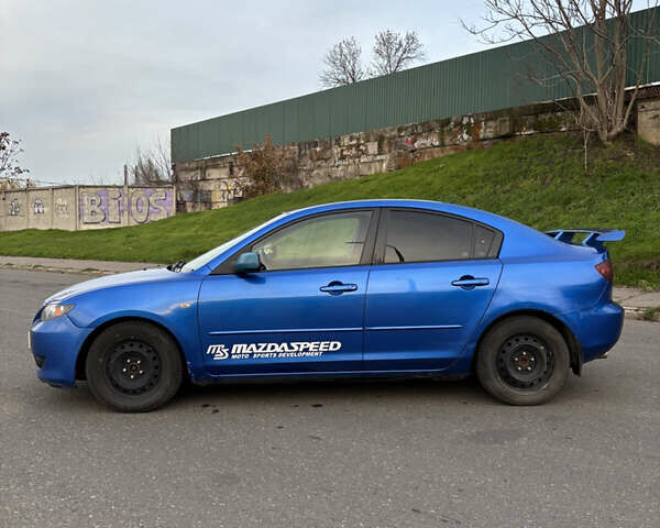 Синий Мазда 3, объемом двигателя 2 л и пробегом 325 тыс. км за 4500 $, фото 3 на Automoto.ua