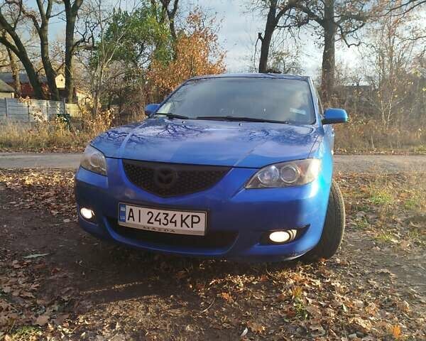 Синий Мазда 3, объемом двигателя 1.6 л и пробегом 220 тыс. км за 4600 $, фото 1 на Automoto.ua