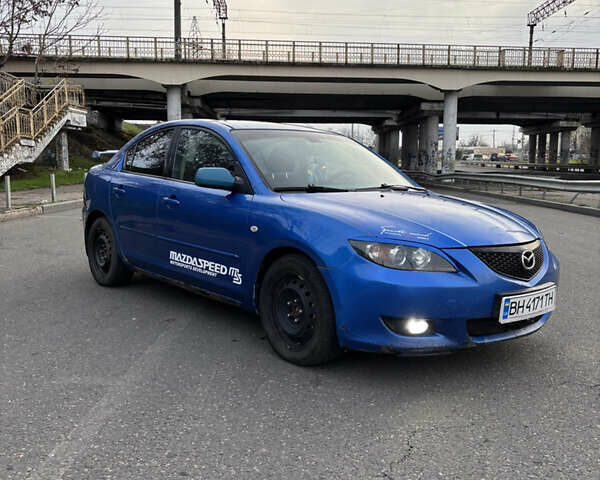 Синий Мазда 3, объемом двигателя 2 л и пробегом 325 тыс. км за 4500 $, фото 2 на Automoto.ua
