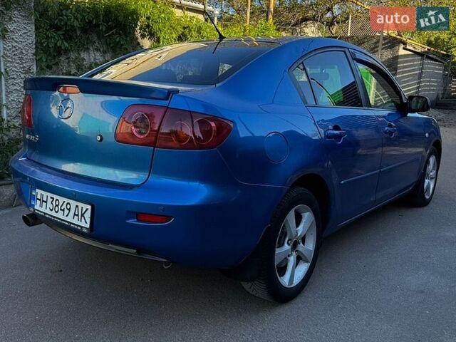 Синий Мазда 3, объемом двигателя 1.6 л и пробегом 227 тыс. км за 3400 $, фото 4 на Automoto.ua