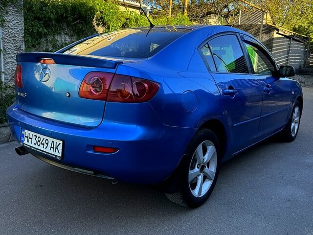 Синий Мазда 3, объемом двигателя 1.6 л и пробегом 185 тыс. км за 3400 $, фото 5 на Automoto.ua