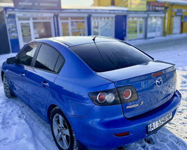Синий Мазда 3, объемом двигателя 1.6 л и пробегом 280 тыс. км за 4950 $, фото 7 на Automoto.ua