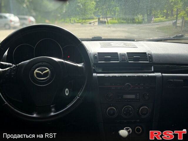 Синій Мазда 3, об'ємом двигуна 1.6 л та пробігом 225 тис. км за 3300 $, фото 5 на Automoto.ua