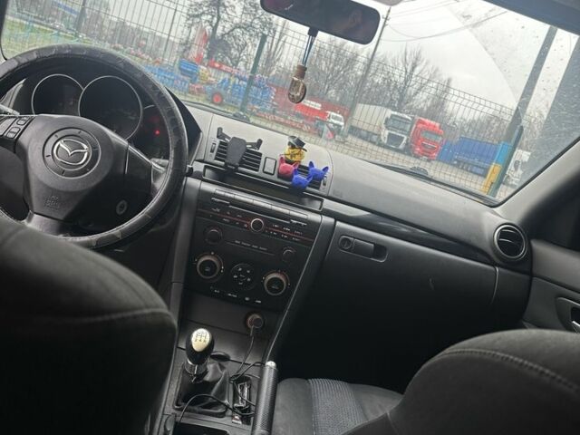 Синій Мазда 3, об'ємом двигуна 1.6 л та пробігом 270 тис. км за 1900 $, фото 7 на Automoto.ua