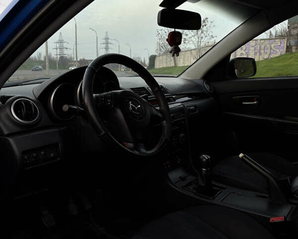 Синий Мазда 3, объемом двигателя 2 л и пробегом 325 тыс. км за 4500 $, фото 9 на Automoto.ua