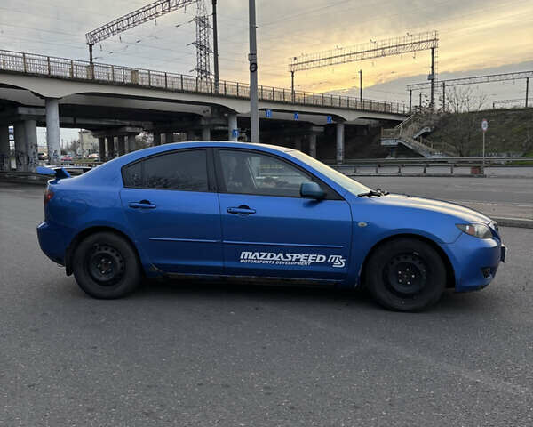 Синий Мазда 3, объемом двигателя 2 л и пробегом 325 тыс. км за 4500 $, фото 4 на Automoto.ua