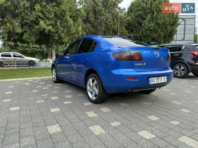 Синий Мазда 3, объемом двигателя 1.6 л и пробегом 240 тыс. км за 3800 $, фото 5 на Automoto.ua