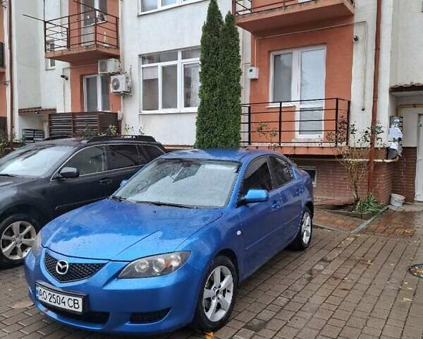 Синий Мазда 3, объемом двигателя 1.6 л и пробегом 186 тыс. км за 4450 $, фото 1 на Automoto.ua