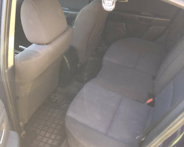 Синий Мазда 3, объемом двигателя 1.6 л и пробегом 175 тыс. км за 3500 $, фото 5 на Automoto.ua