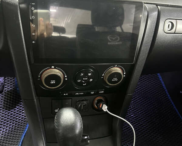 Мазда 3 2005 в Каменское - Днепродзержинск на Automoto.ua Синий Мазда 3, объемом двигателя 2 л и пробегом 259 тыс. км за 5200 $, фото 21 на Automoto.ua