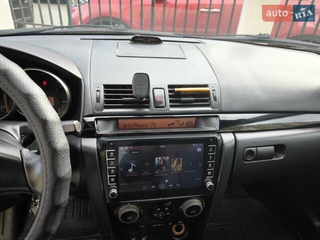 Синій Мазда 3, об'ємом двигуна 1.6 л та пробігом 142 тис. км за 6500 $, фото 26 на Automoto.ua