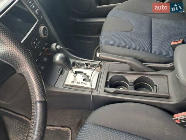 Синий Мазда 3, объемом двигателя 1.6 л и пробегом 185 тыс. км за 6000 $, фото 10 на Automoto.ua