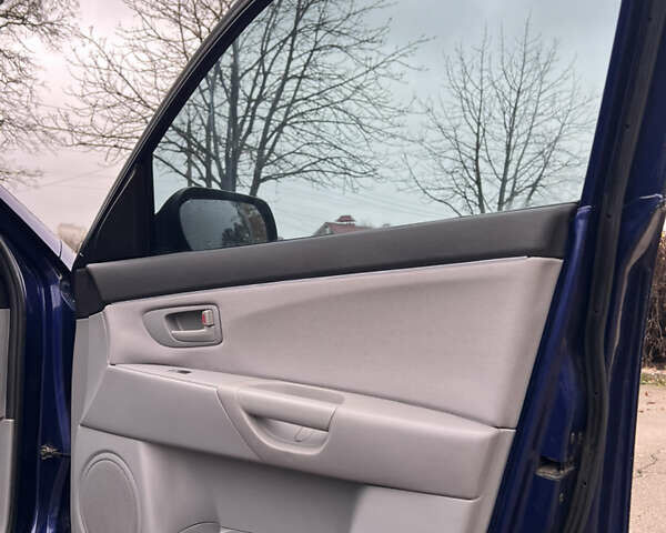 Синій Мазда 3, об'ємом двигуна 1.6 л та пробігом 228 тис. км за 4350 $, фото 18 на Automoto.ua