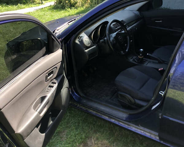 Синий Мазда 3, объемом двигателя 1.6 л и пробегом 175 тыс. км за 3500 $, фото 4 на Automoto.ua
