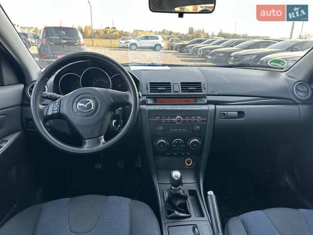 Синий Мазда 3, объемом двигателя 1.6 л и пробегом 205 тыс. км за 4450 $, фото 5 на Automoto.ua
