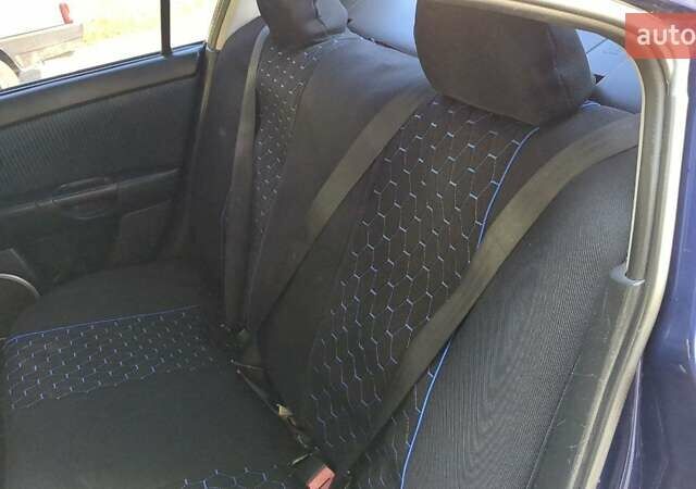 Синий Мазда 3, объемом двигателя 1.56 л и пробегом 270 тыс. км за 4700 $, фото 5 на Automoto.ua