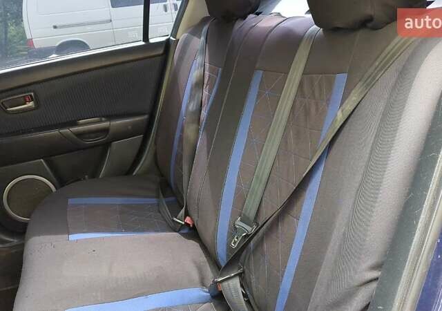 Синий Мазда 3, объемом двигателя 1.56 л и пробегом 270 тыс. км за 4700 $, фото 7 на Automoto.ua