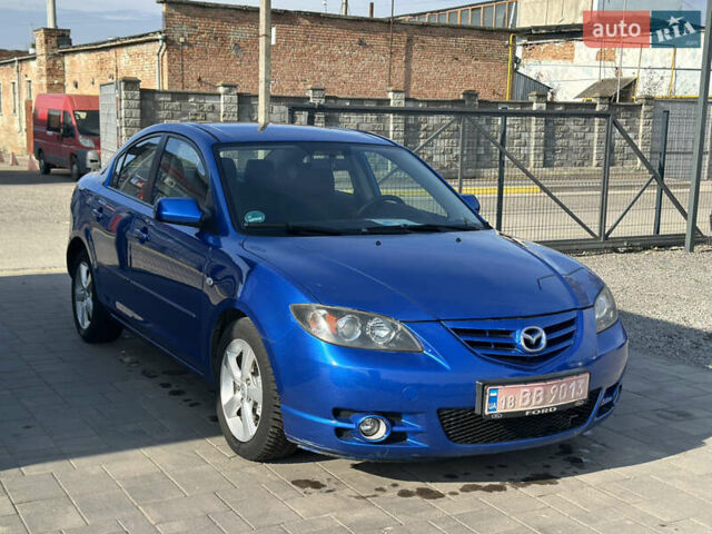 Синий Мазда 3, объемом двигателя 1.6 л и пробегом 205 тыс. км за 4450 $, фото 2 на Automoto.ua