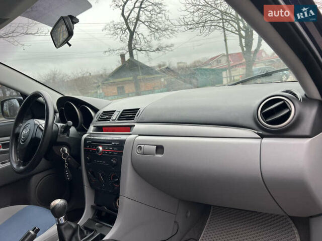 Синій Мазда 3, об'ємом двигуна 1.6 л та пробігом 228 тис. км за 4350 $, фото 19 на Automoto.ua